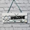 Välkommenskylt i trä med Welcome - modern marin inredning
