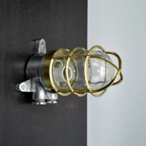 Vintage polished aluminium wall lamp with brass cage for nautical UK homes